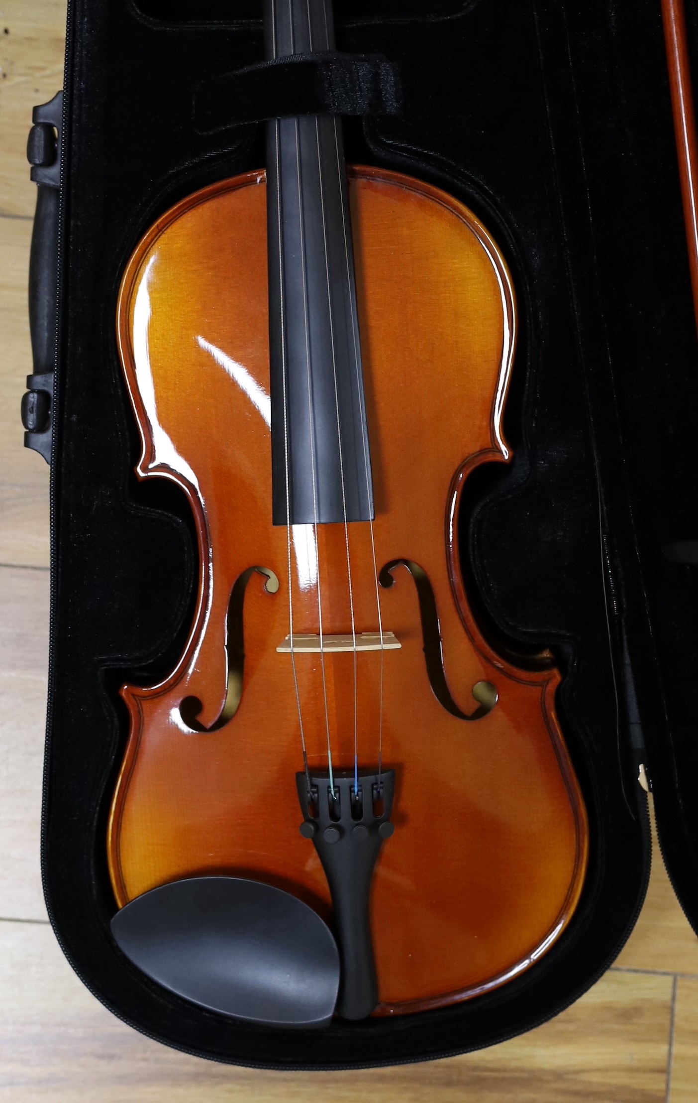 A cased early 20th century violin marked Gilks, Westminster, London and 2 modern cased Chinese violins